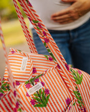 Matelas à langer de voyage Wulan Gardenia corail